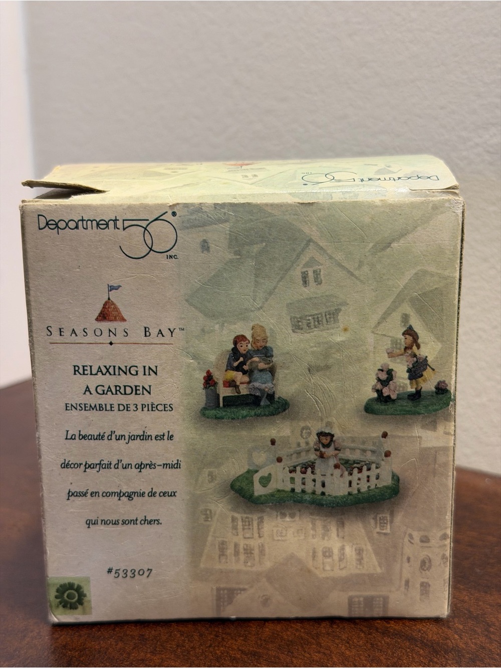 Department 56 Seasons Bay 
Relaxing In A Garden #53307
